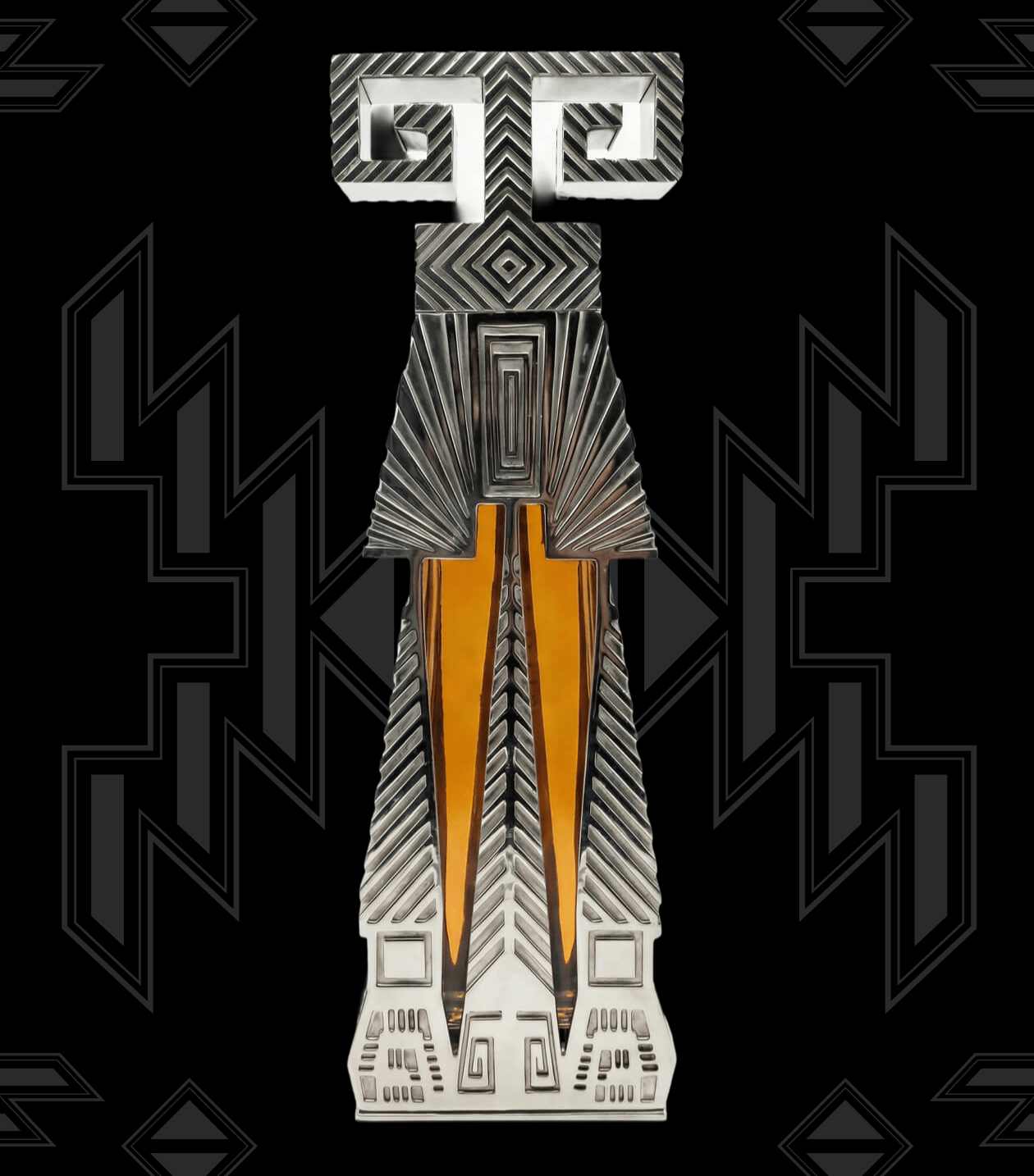 A stylized, symmetrical geometric figure or emblem in metallic silver-gray with bright orange vertical accents, centered on a black background with dark gray geometric patterns.